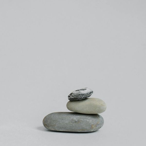 Abstract image of a balanced stone stack representing philosophy and calm.